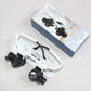 Gafas binoculares con lupa y luz